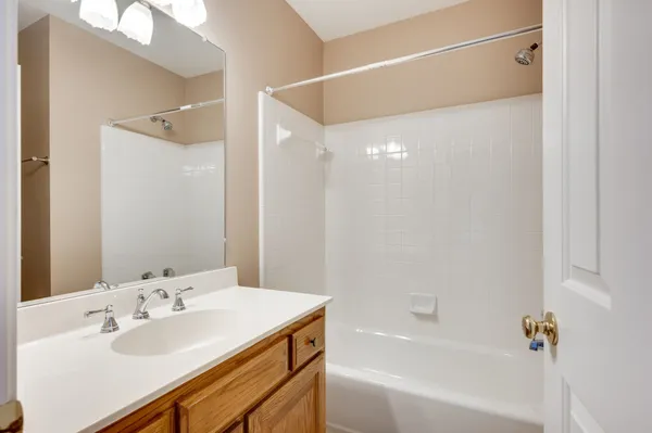 a bathroom with a sink and a bathtub