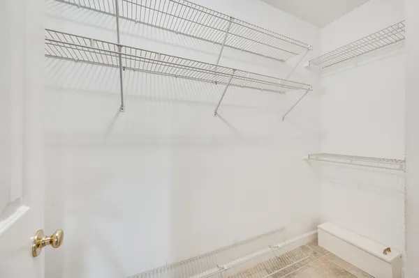 a view of small space with racks on the wall