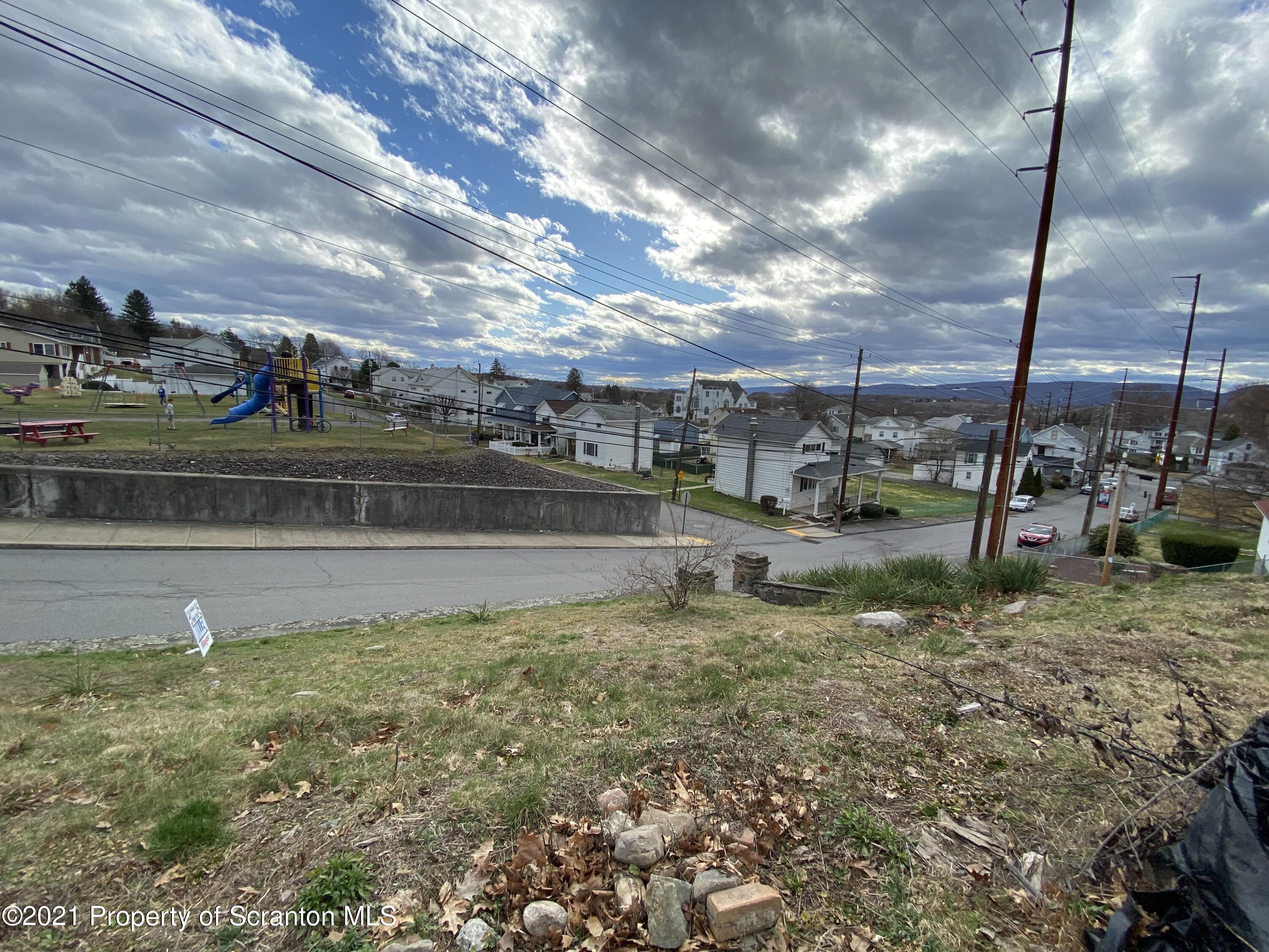 1001 Plane Street Avoca, PA 18641 - Photo 2 of 4 a view of a park with swings
