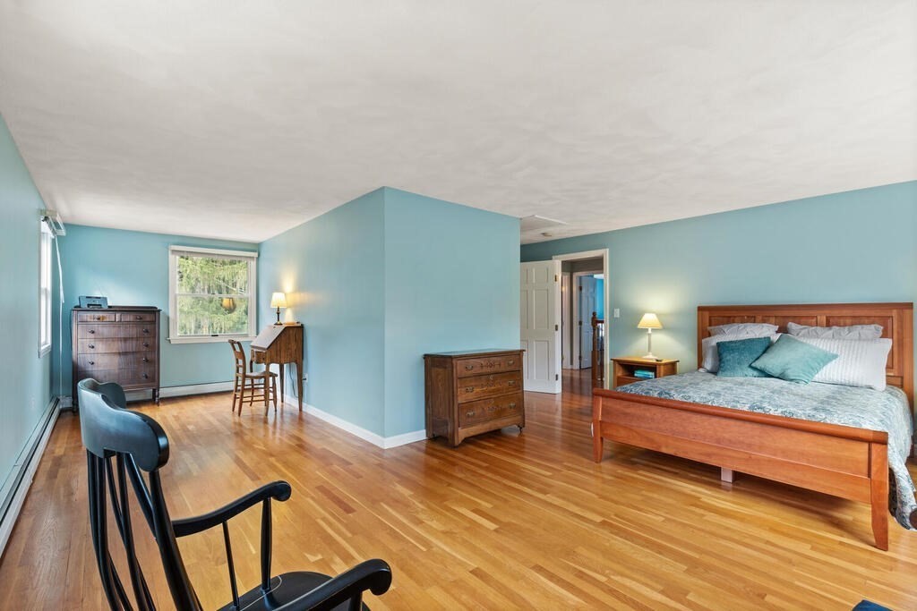 28 Montview Road Chelmsford, MA 01824 - Photo 20 of 38 a bedroom with furniture and a wooden floor