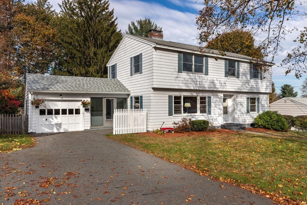 28 Montview Road Chelmsford, MA 01824 - Photo 2 of 38 a front view of a house with a yard