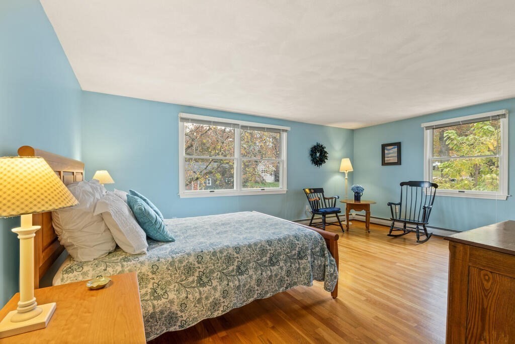 28 Montview Road Chelmsford, MA 01824 - Photo 21 of 38 a bed room with a bed and a chair