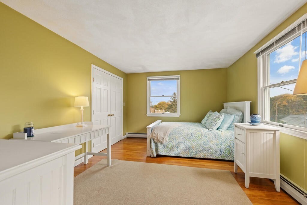 28 Montview Road Chelmsford, MA 01824 - Photo 24 of 38 a spacious bedroom with a bed and a large window