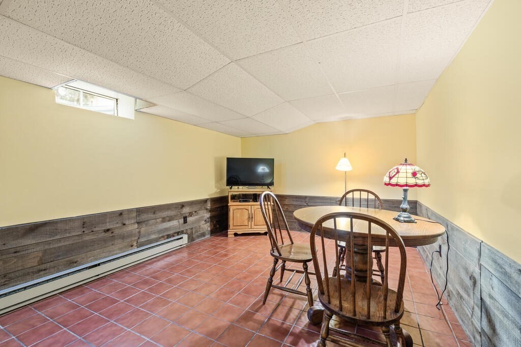 28 Montview Road Chelmsford, MA 01824 - Photo 29 of 38 a view of a dining room with furniture and a potted plant