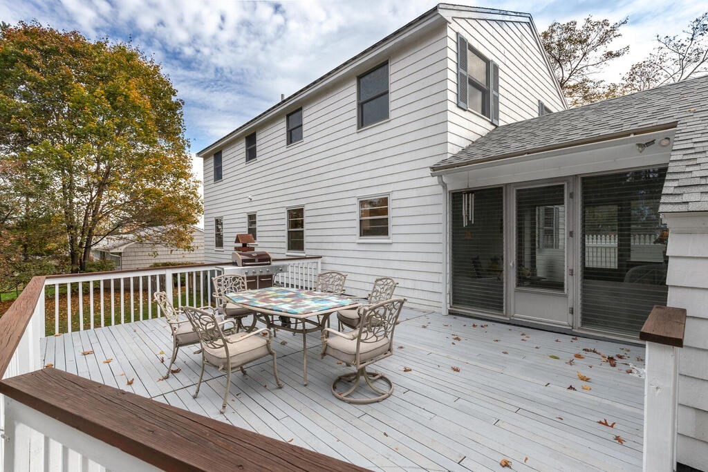 28 Montview Road Chelmsford, MA 01824 - Photo 35 of 38 a view of a chairs and table on the deck