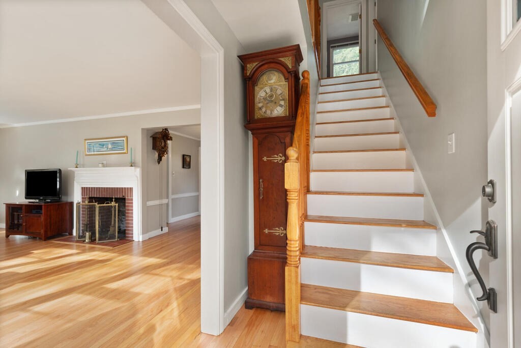 28 Montview Road Chelmsford, MA 01824 - Photo 4 of 38 a view of a livingroom with wooden floor and white walls