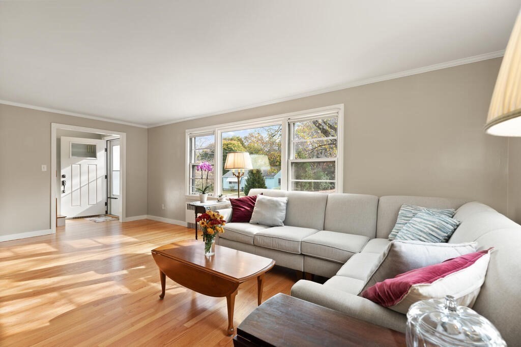 28 Montview Road Chelmsford, MA 01824 - Photo 7 of 38 a living room with furniture and a large window