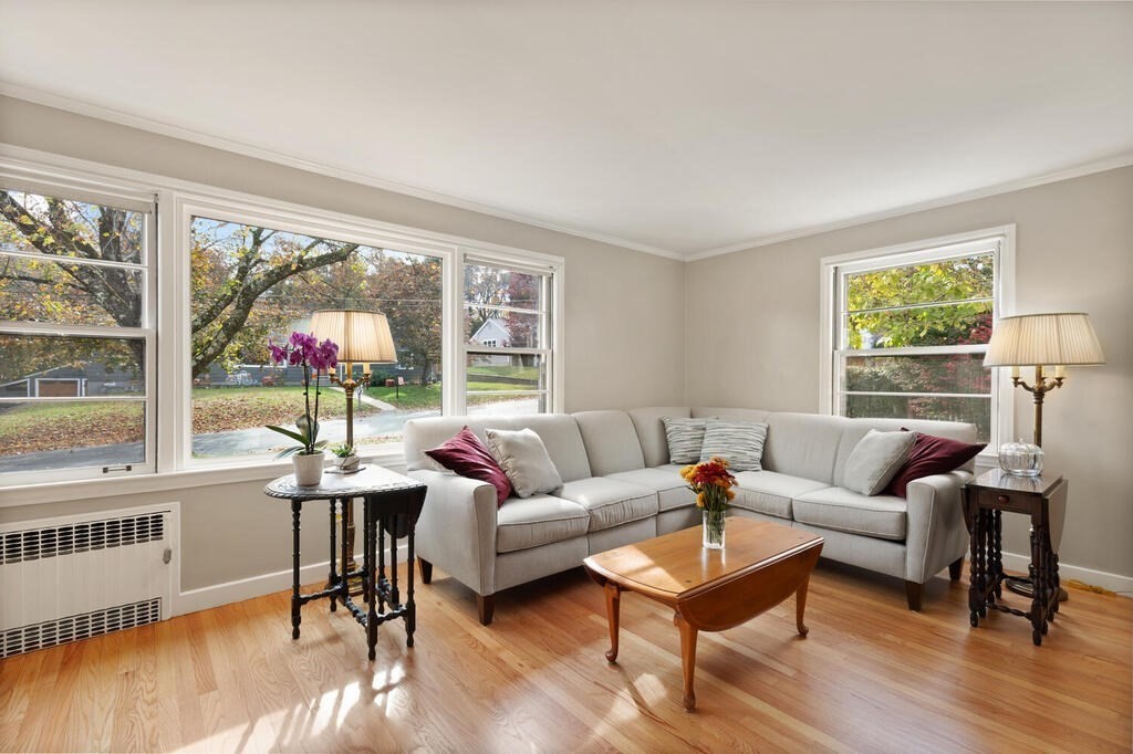 28 Montview Road Chelmsford, MA 01824 - Photo 8 of 38 a living room with furniture and a large window
