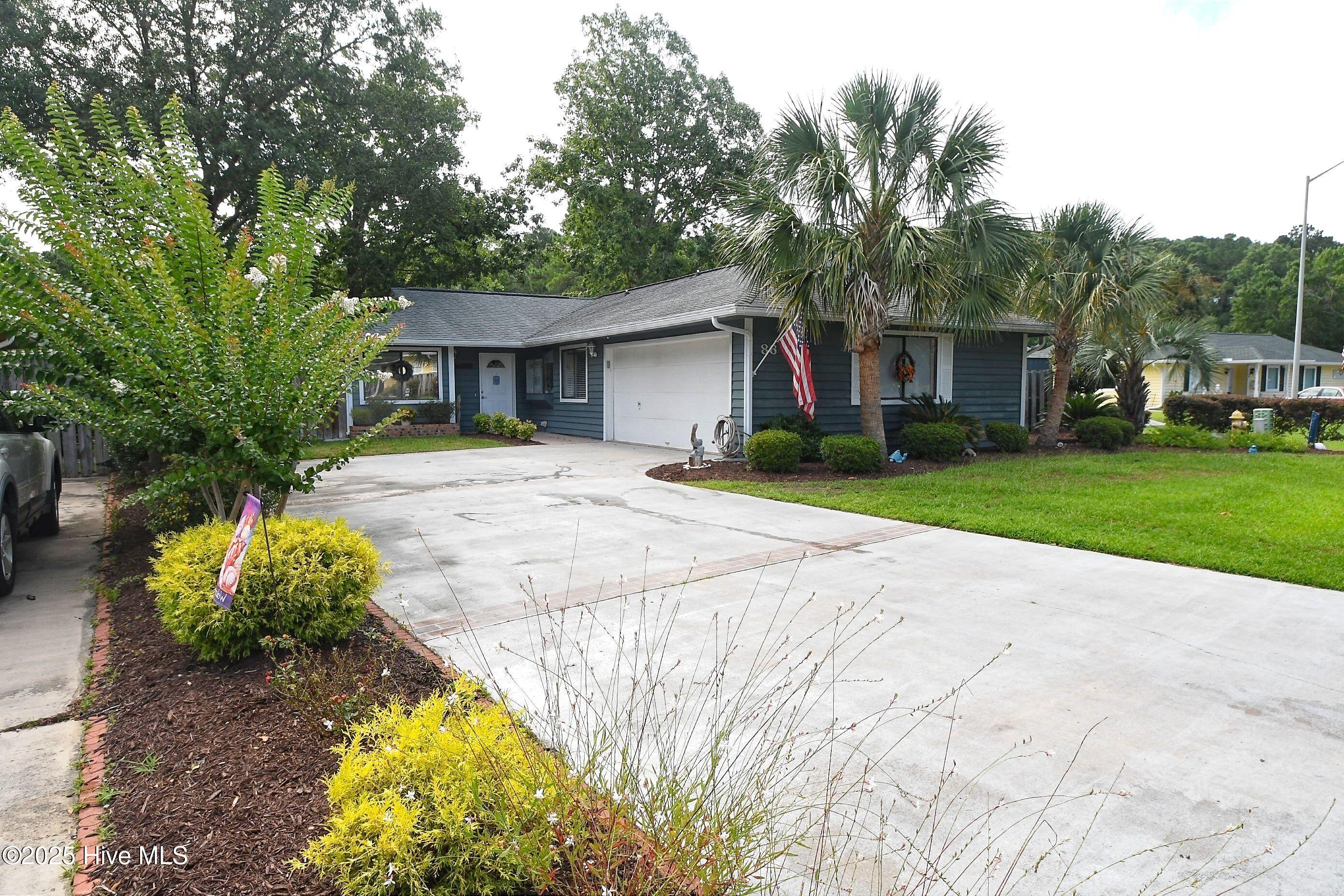 86 Cedar Tree Lane Southwest Calabash, NC 28467 - Photo 2 of 36 2-car Garage