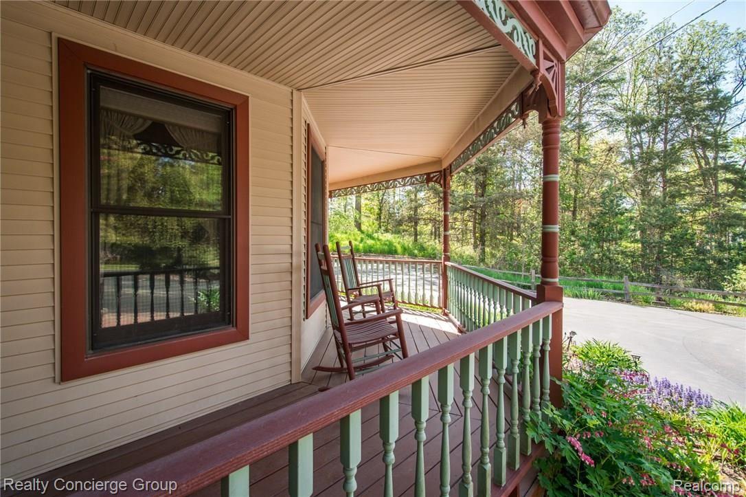 6022 Challis Road Brighton, MI 48116 - Photo 37 of 41 Imagine rocking on the front porch!