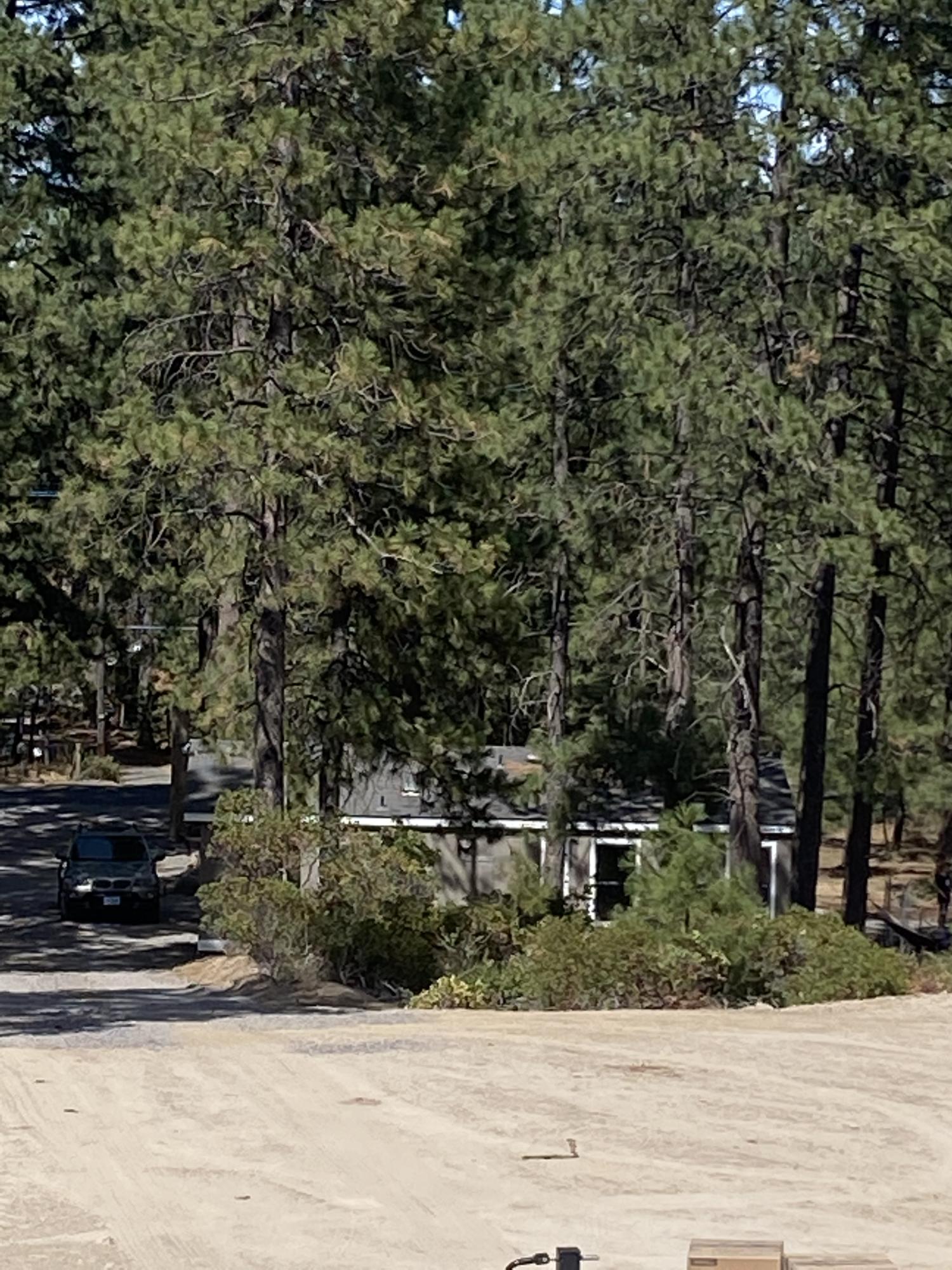 19197 Kiowa Road Bend, OR 97702 - Photo 13 of 32 a front view of a house with a yard