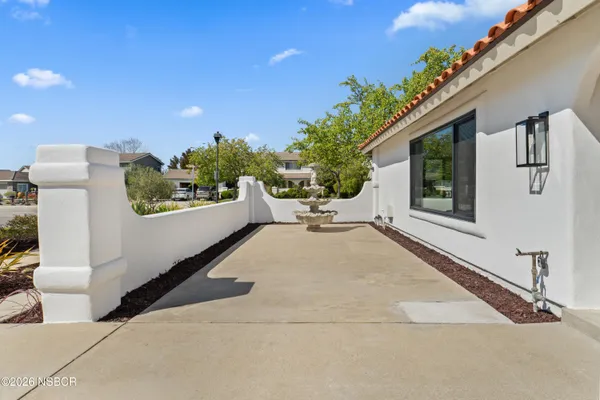 a house with trees in front of it