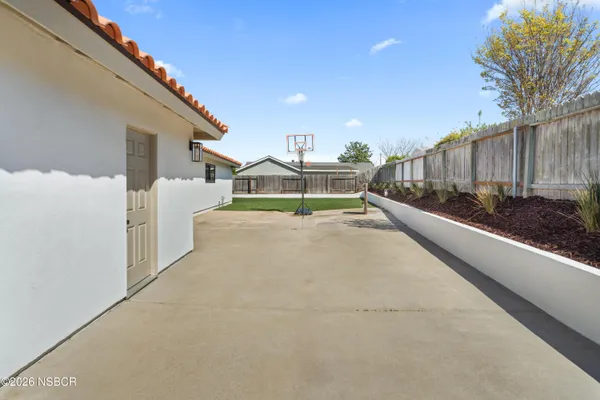 a view of swimming pool with a yard