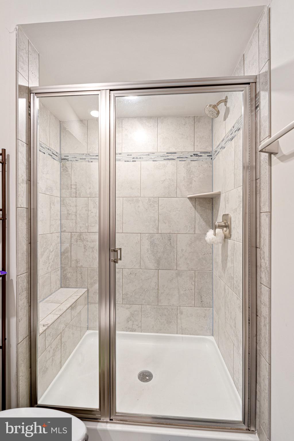 7583 Marston Way Hanover, MD 21076 - Photo 17 of 36 a bathroom with a shower