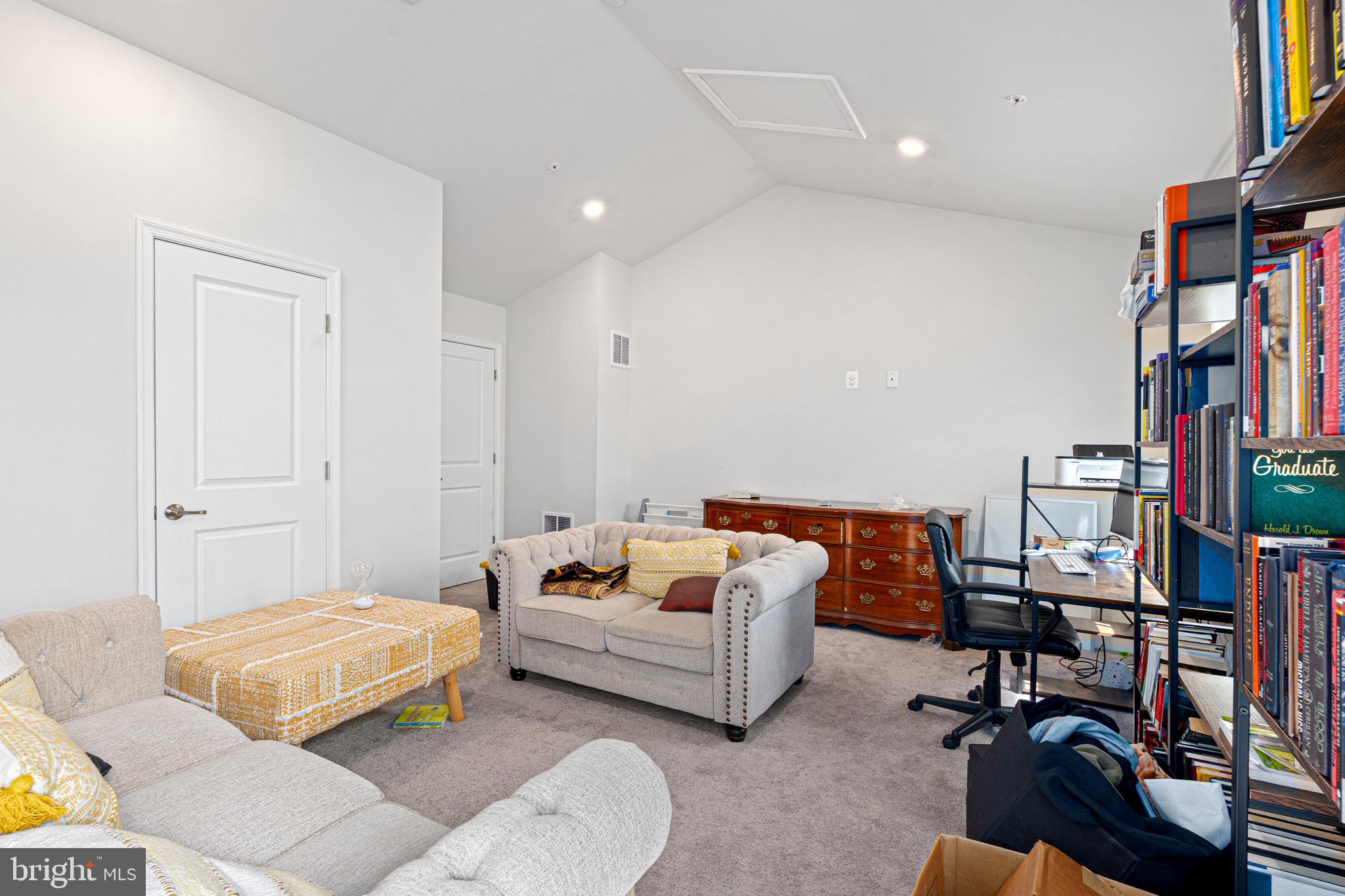 7583 Marston Way Hanover, MD 21076 - Photo 28 of 36 a bedroom with furniture and a book shelf
