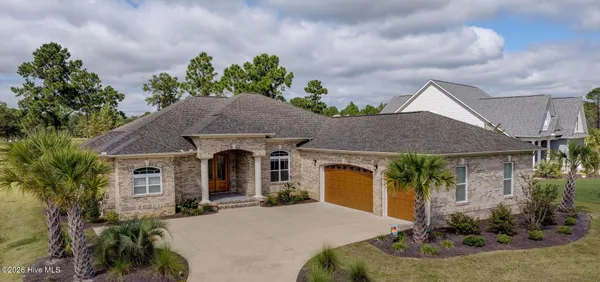 $900,000 | 8711 Compass Pointe West Wynd Street Northeast, Unit WYND, Leland, NC 28451