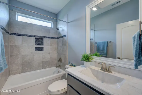 $900,000 | 8711 Compass Pointe West Wynd Street Northeast, Unit WYND, Leland, NC 28451