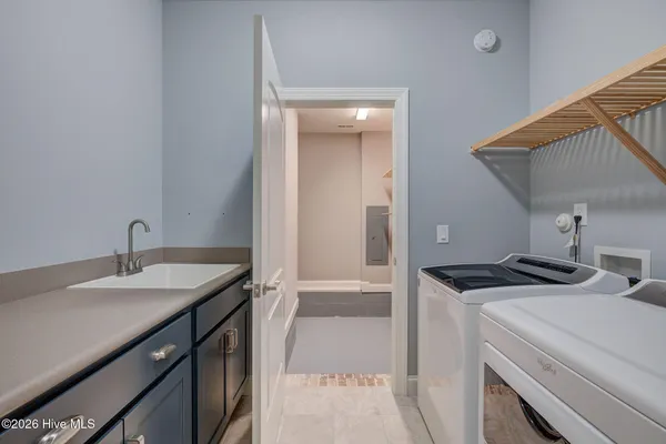 $900,000 | 8711 Compass Pointe West Wynd Street Northeast, Unit WYND, Leland, NC 28451