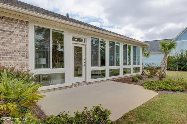 $900,000 | 8711 Compass Pointe West Wynd Street Northeast, Unit WYND, Leland, NC 28451