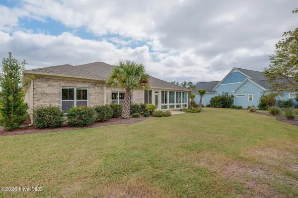 $900,000 | 8711 Compass Pointe West Wynd Street Northeast, Unit WYND, Leland, NC 28451