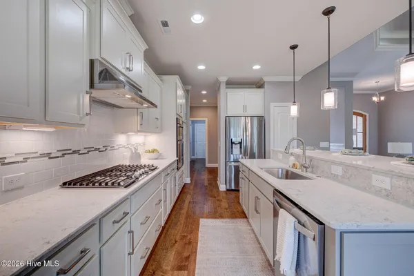 $900,000 | 8711 Compass Pointe West Wynd Street Northeast, Unit WYND, Leland, NC 28451
