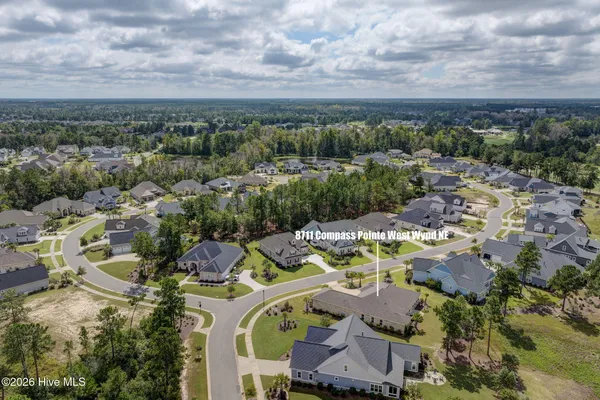 $900,000 | 8711 Compass Pointe West Wynd Street Northeast, Unit WYND, Leland, NC 28451