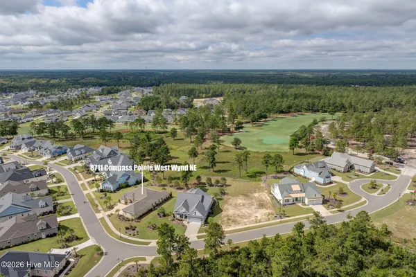 $900,000 | 8711 Compass Pointe West Wynd Street Northeast, Unit WYND, Leland, NC 28451
