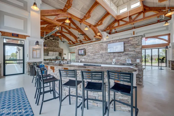 $900,000 | 8711 Compass Pointe West Wynd Street Northeast, Unit WYND, Leland, NC 28451