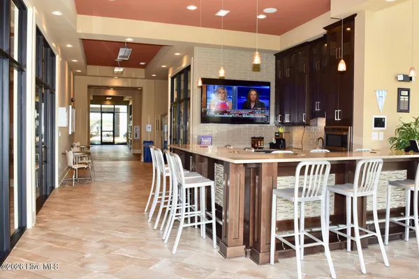 $900,000 | 8711 Compass Pointe West Wynd Street Northeast, Unit WYND, Leland, NC 28451