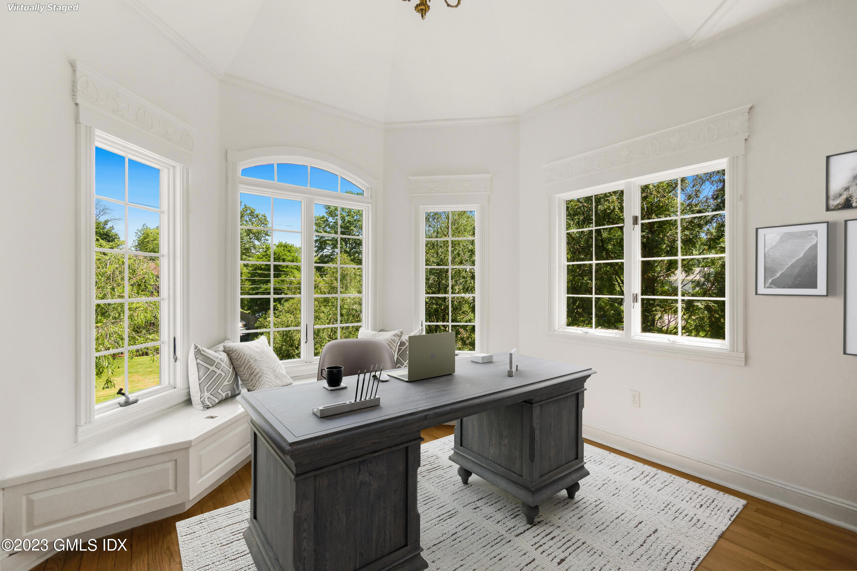 20 Center Road Old Greenwich, CT 06870 - Photo 17 of 35 a work room with large window wooden floor and table