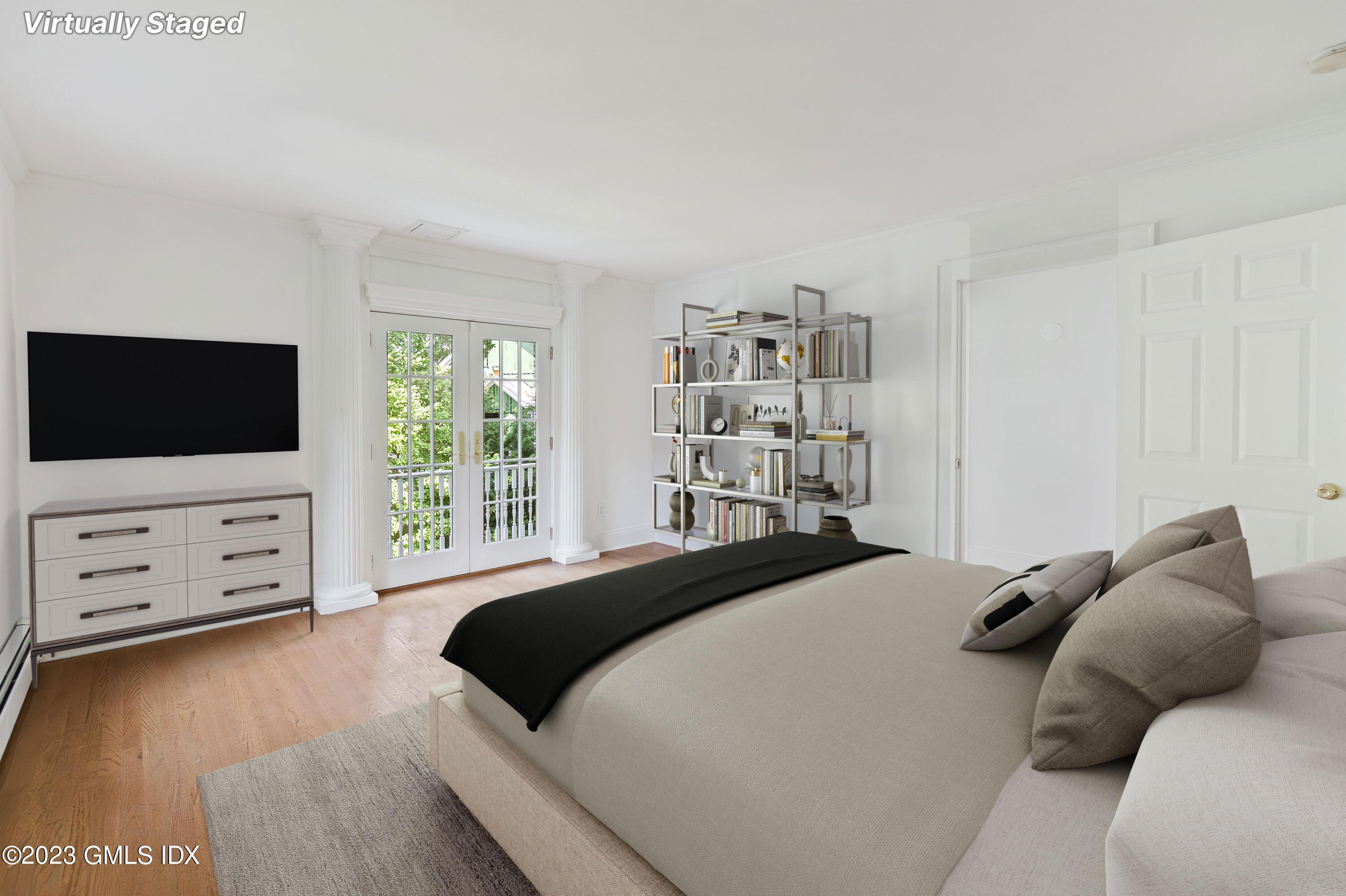 20 Center Road Old Greenwich, CT 06870 - Photo 23 of 35 a bedroom with a bed and flat screen tv