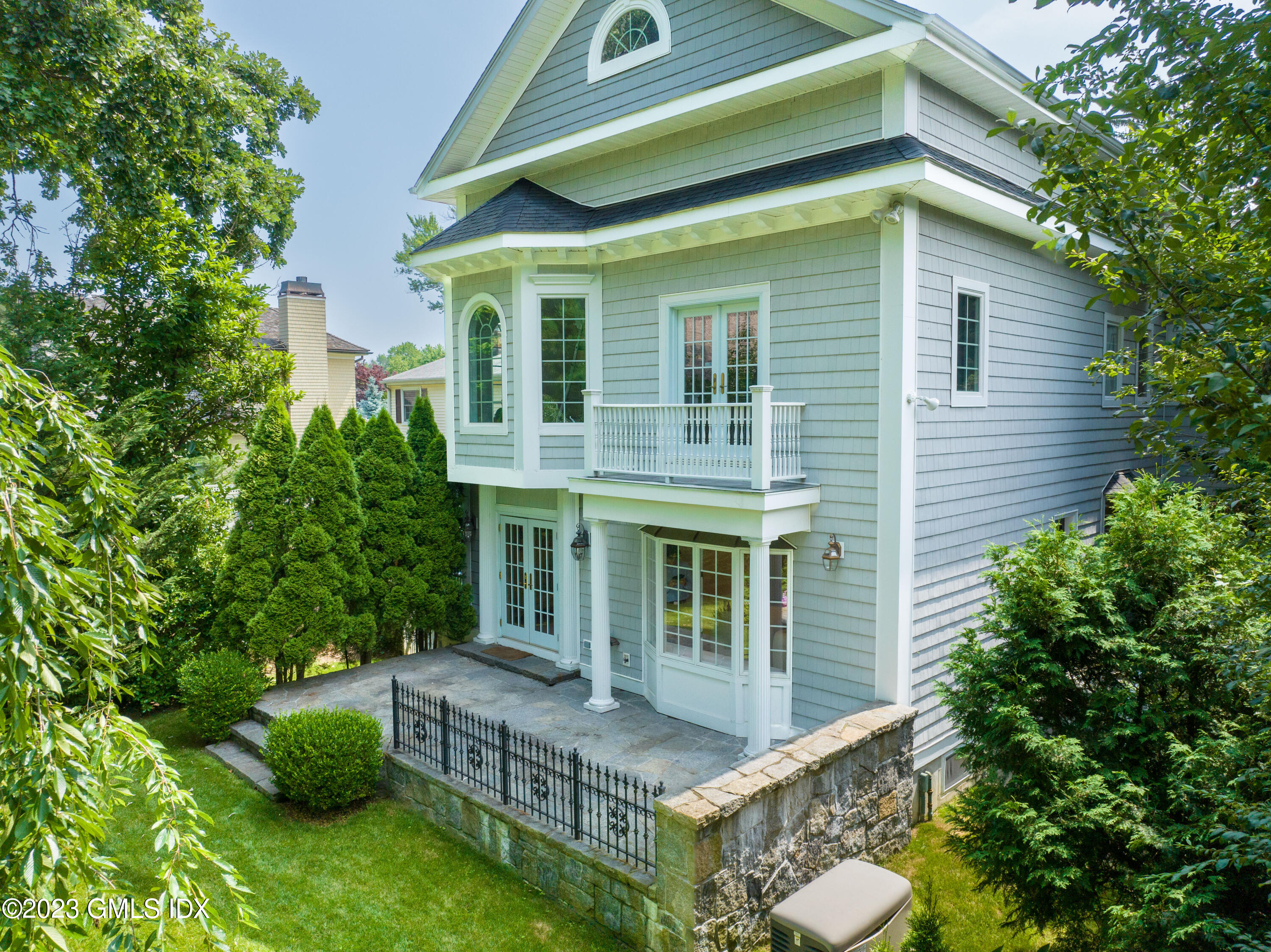 20 Center Road Old Greenwich, CT 06870 - Photo 29 of 35 a view of house that has a balcony