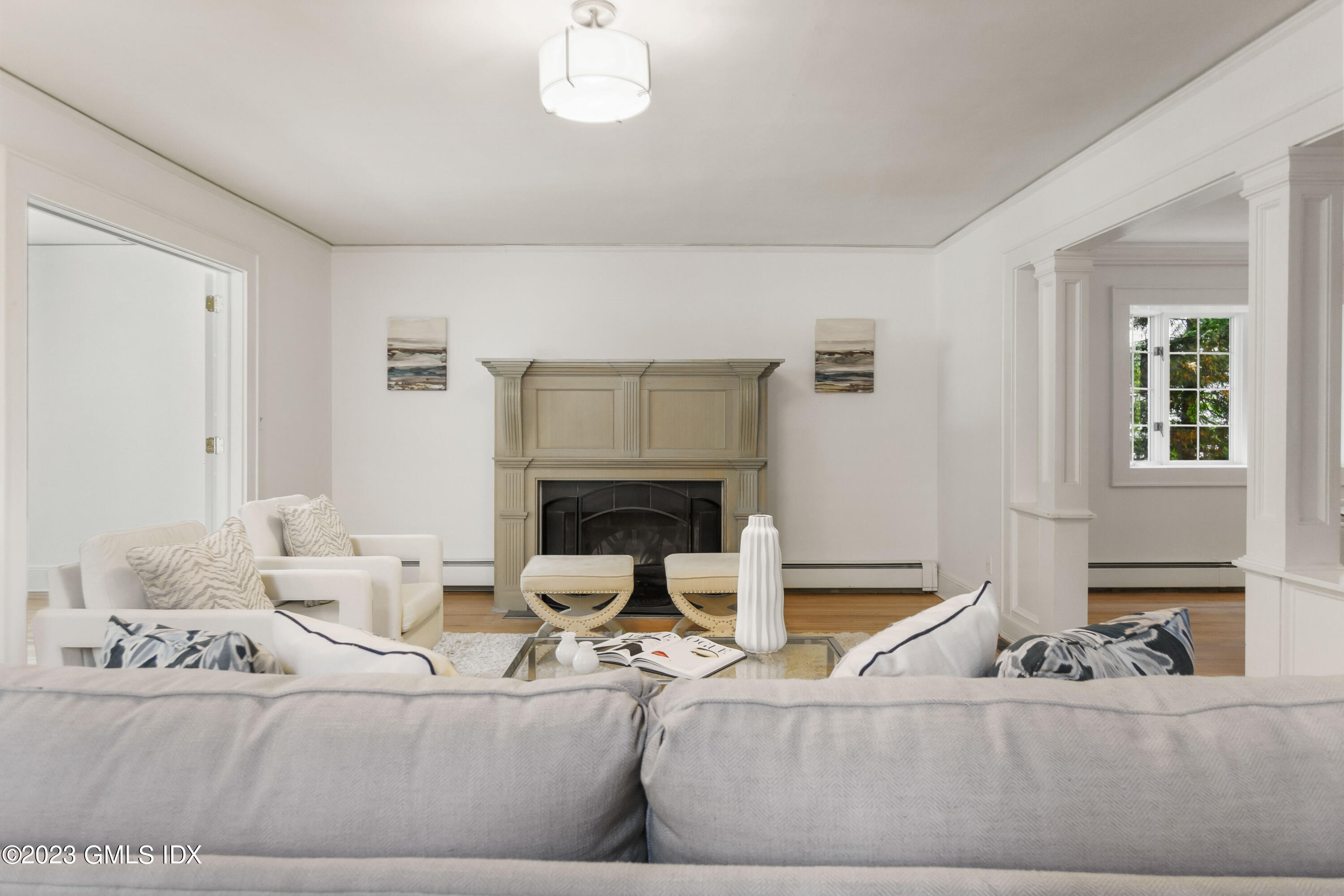20 Center Road Old Greenwich, CT 06870 - Photo 6 of 35 a living room with furniture and a fireplace