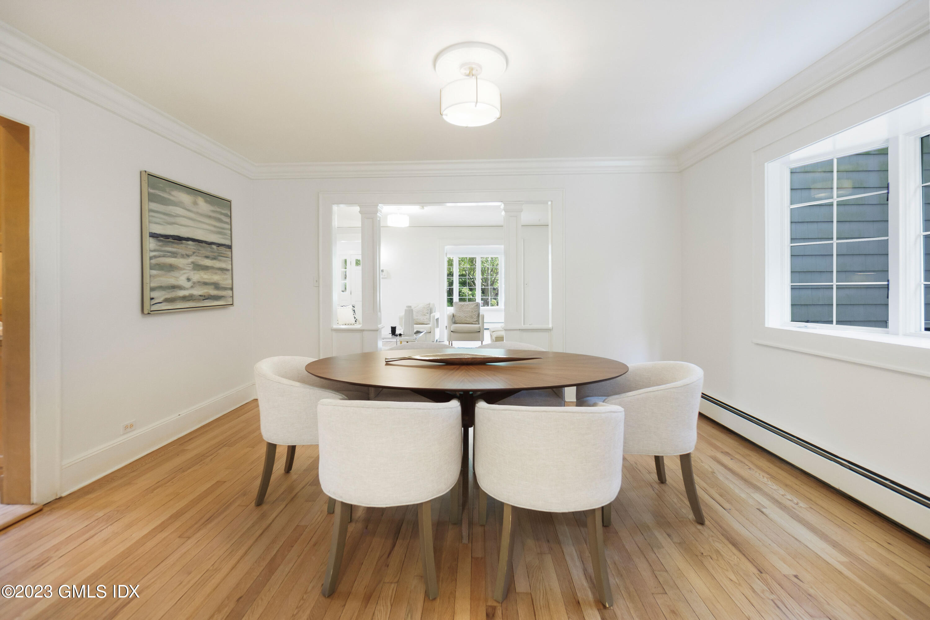 20 Center Road Old Greenwich, CT 06870 - Photo 7 of 35 a view of a dining room with furniture window and wooden floor