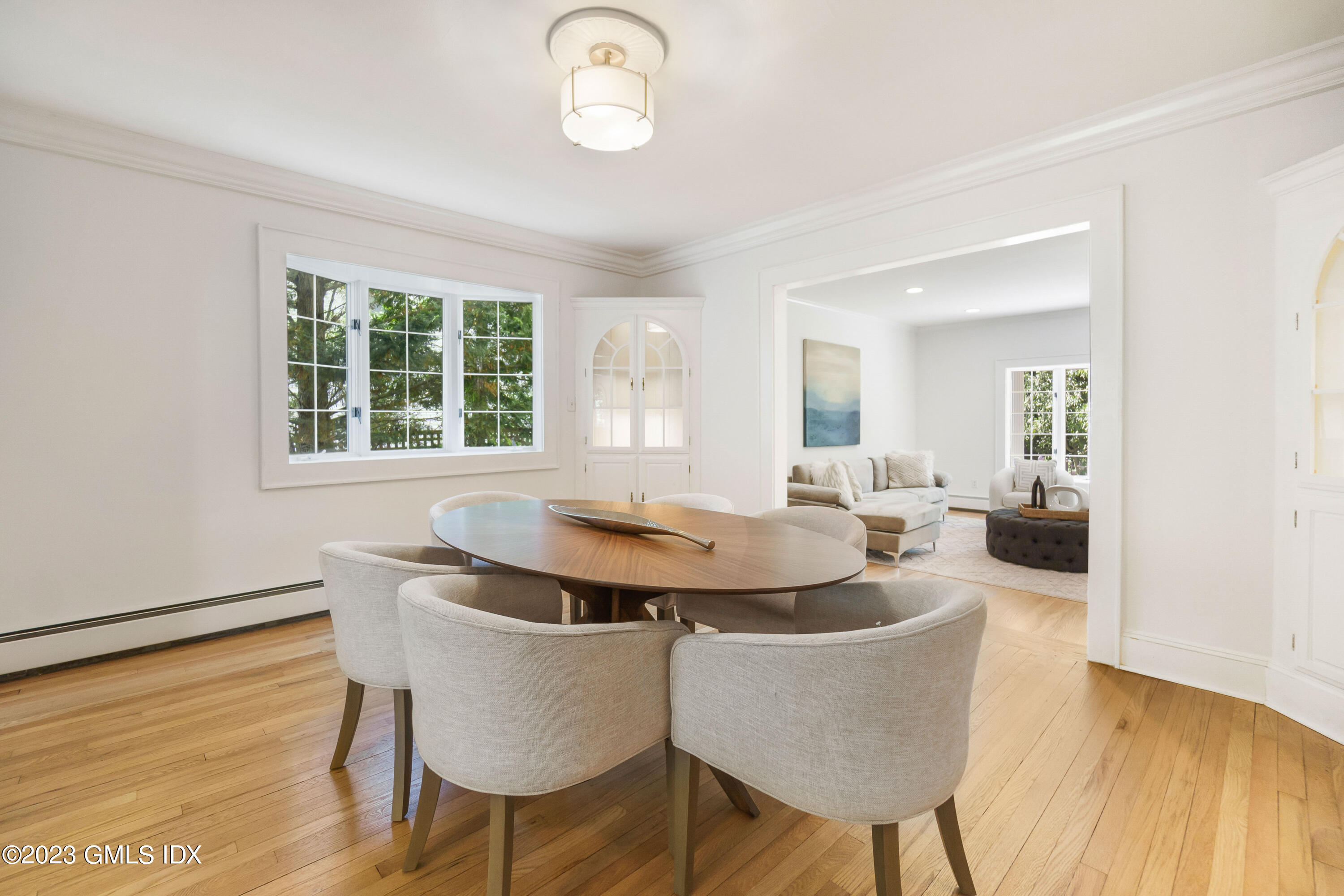 20 Center Road Old Greenwich, CT 06870 - Photo 8 of 35 a dining room with furniture and wooden floor