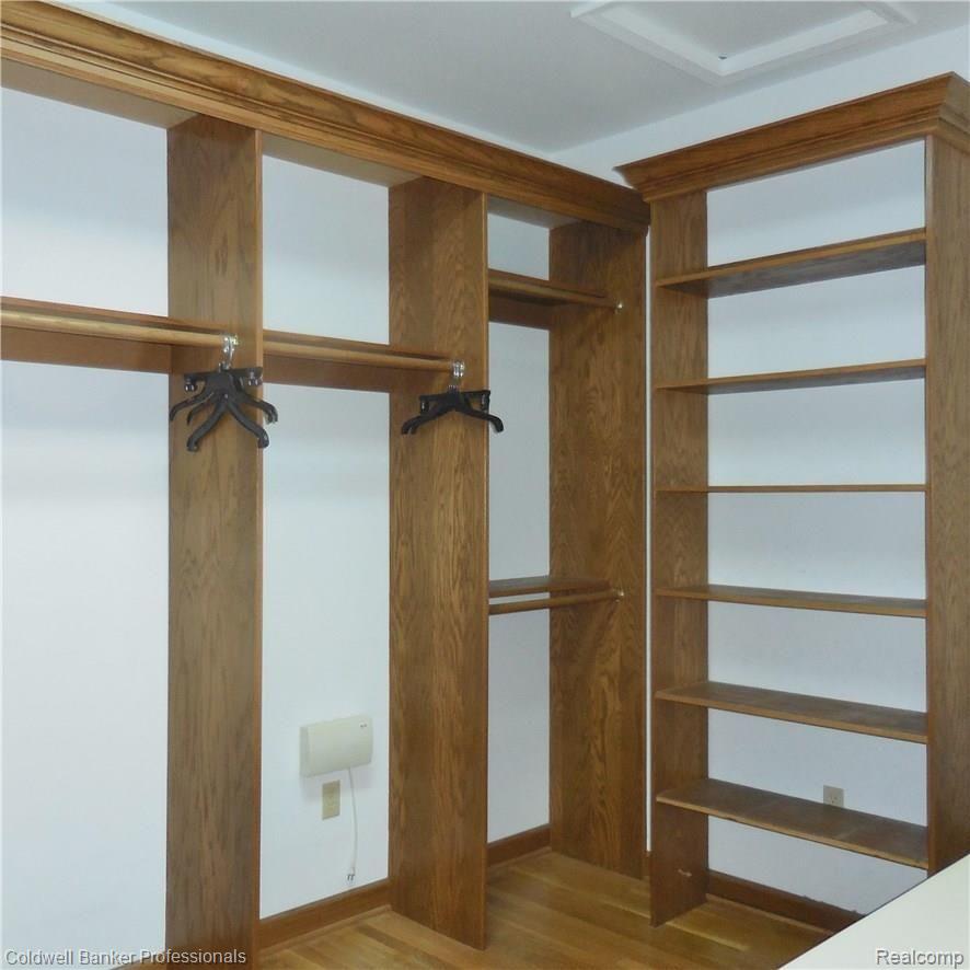 21591 Garfield Road Northville, MI 48167 - Photo 38 of 90 CUSTOM BUILT INS IN THE MASTER BEDROOM WALK IN CLOSET