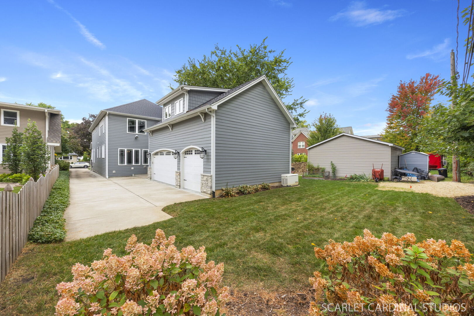 628 North Brainard Street Naperville, IL 60563 - Photo 6 of 8 a view of backyard of house and wooden fence