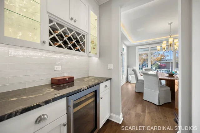 a kitchen with granite countertop a sink and a stove