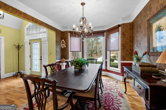 a kitchen with stainless steel appliances granite countertop a stove top oven a sink a counter top space and cabinets