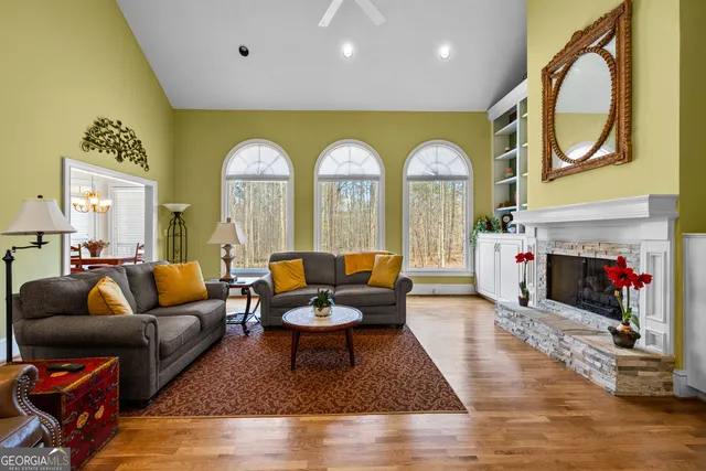a dining room with furniture and window