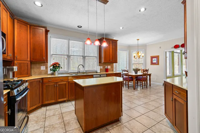 a spacious bedroom with a bed and flat screen tv