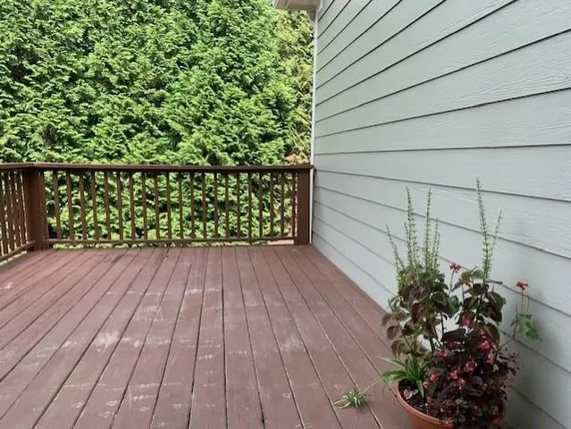 a bathroom with a sink and a granite counter top