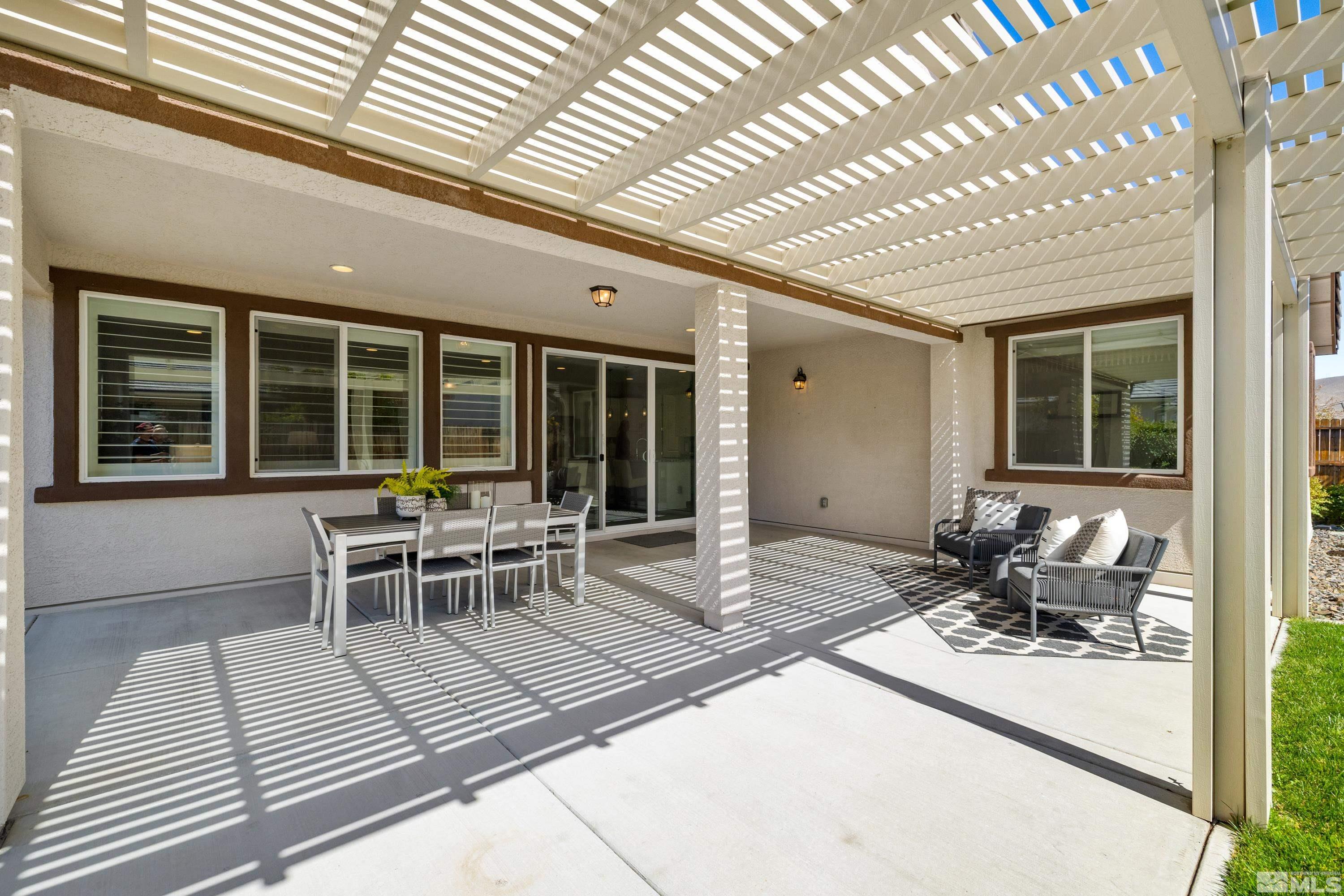 9940 Bernborough Drive Reno, NV 89521 - Photo 23 of 40 a dining room with furniture and window