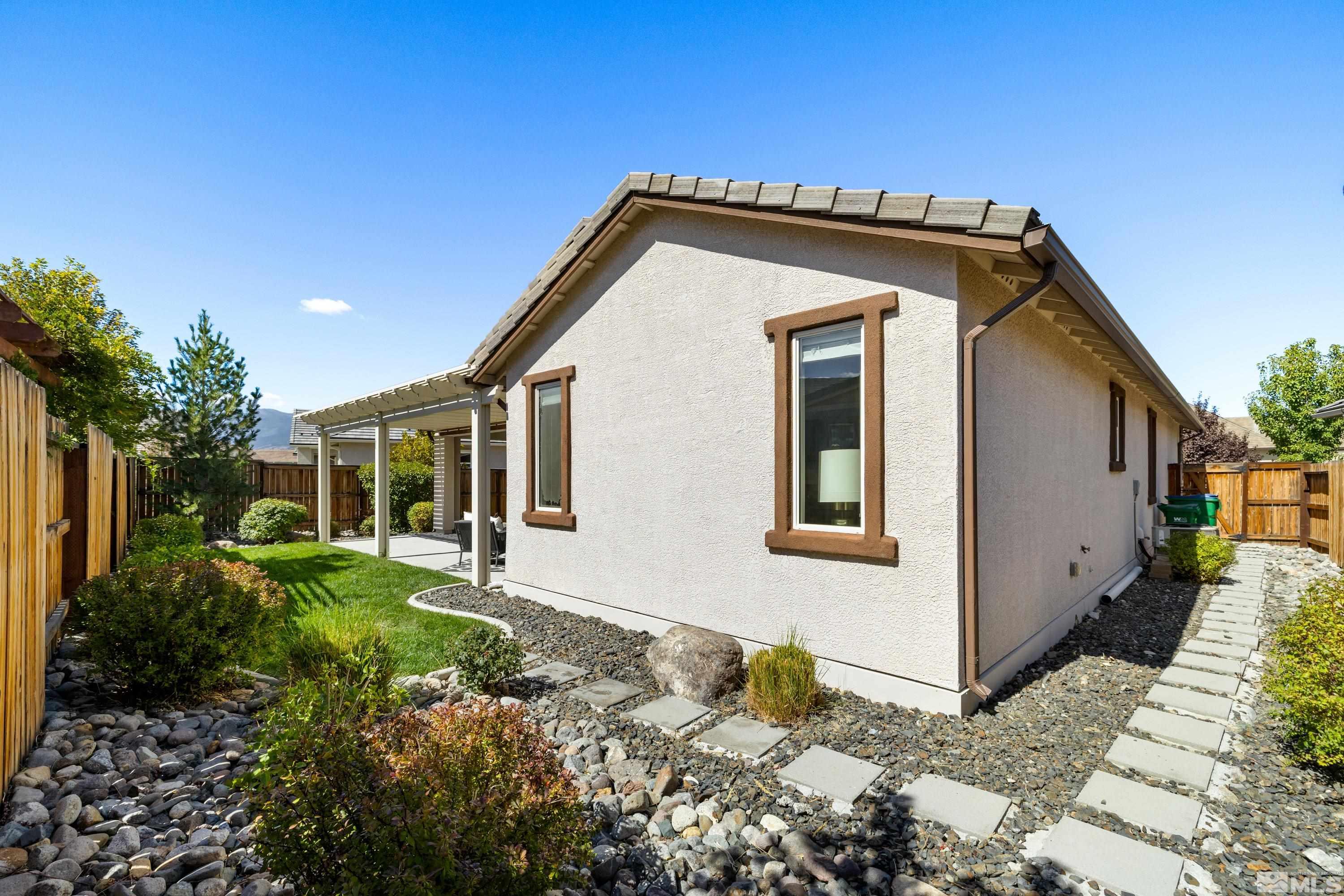9940 Bernborough Drive Reno, NV 89521 - Photo 25 of 40 a view of a house with a yard