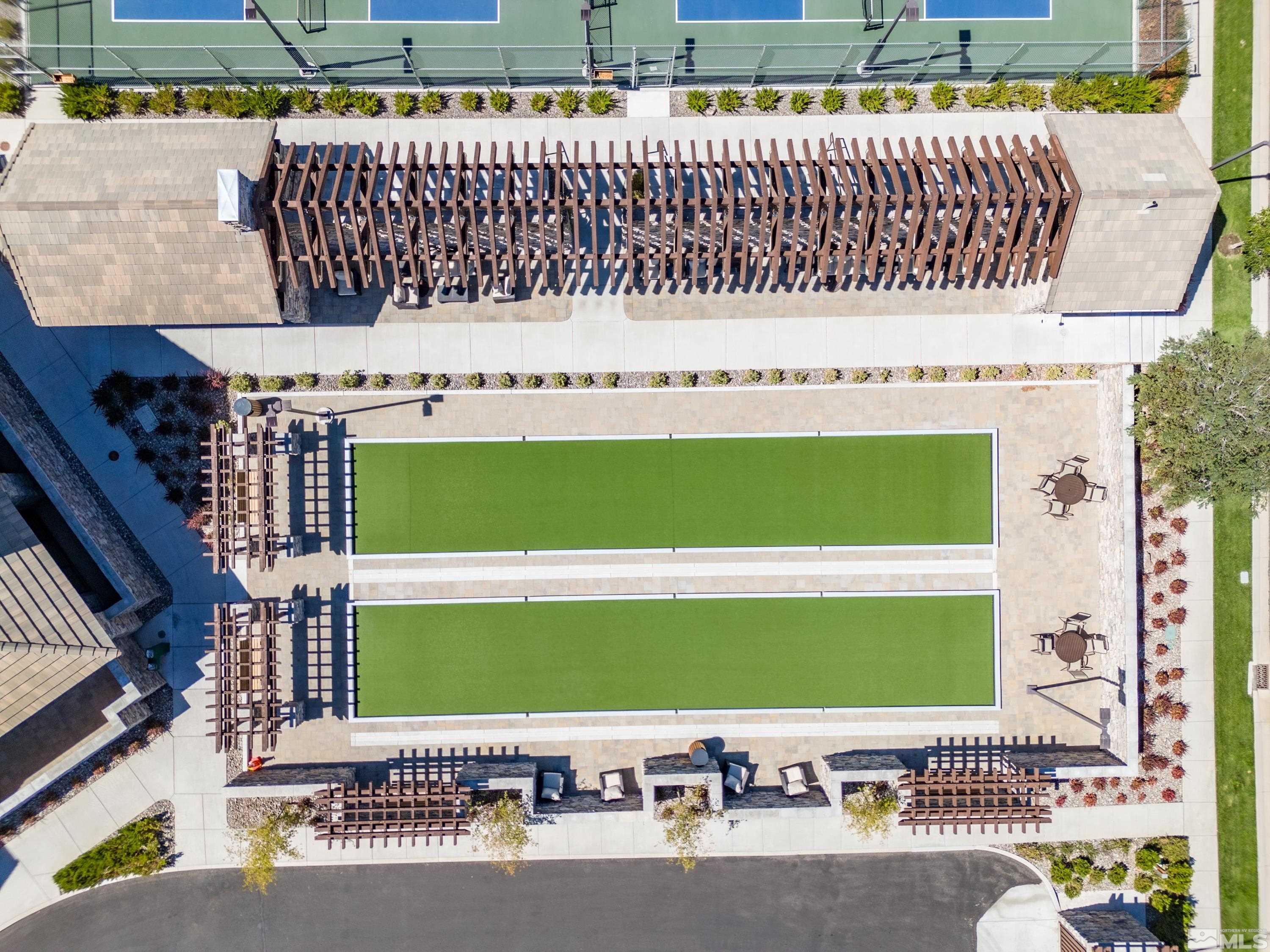 9940 Bernborough Drive Reno, NV 89521 - Photo 32 of 40 a view of a bench with wooden fence