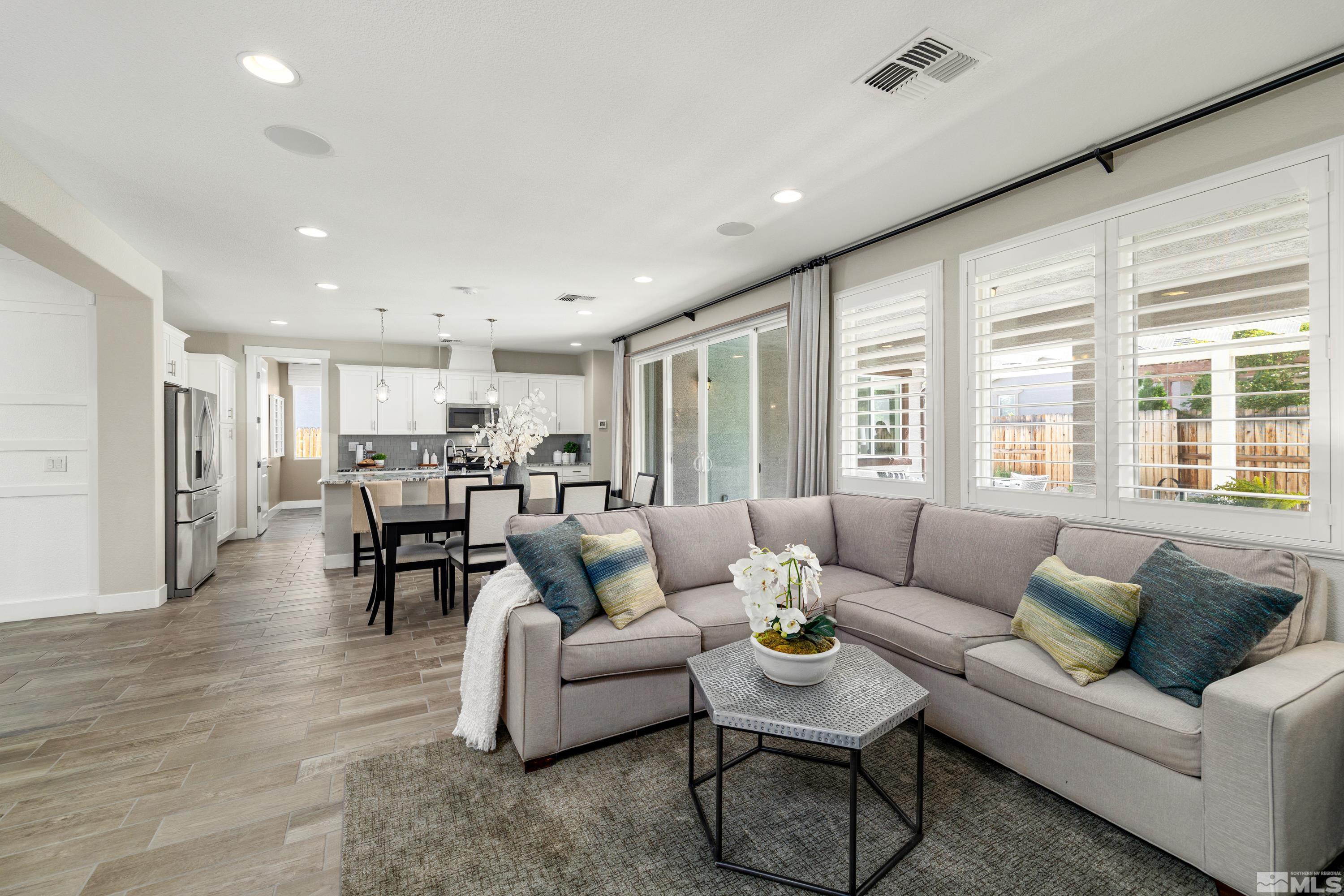 9940 Bernborough Drive Reno, NV 89521 - Photo 8 of 40 a living room with furniture and a large window