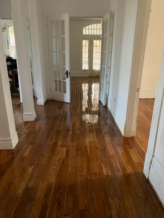 a kitchen with stainless steel appliances granite countertop a sink and a refrigerator