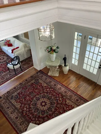 a front view of a house with a backyard