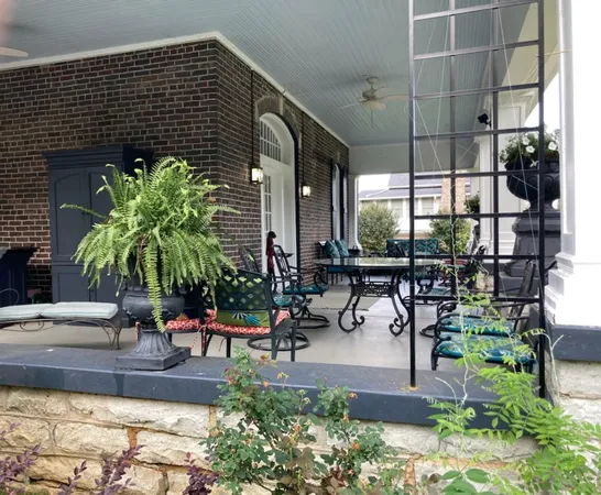 a view of a swimming pool with chairs