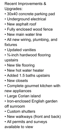 a view of a chair and table of the garden